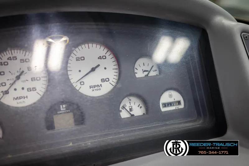 Slide: The Image of Dashboard of a 1996 Thunderbird Falcon 2270 CD with various gauges and dials. - 28