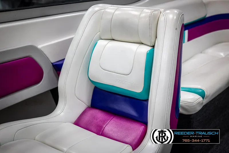 Slide: The Image of 1996 Thunderbird Falcon 2270 CD interior with vibrant white, pink, and blue seating. - 32
