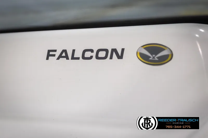 Slide: The Image of 1996 Thunderbird Falcon 2270 CD logo on white surface with emblem. - 34