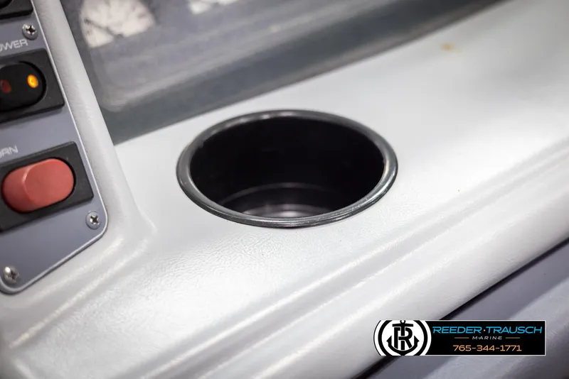 Slide: The Image of 1996 Thunderbird Falcon 2270 CD dashboard with cup holder and control panel. - 36