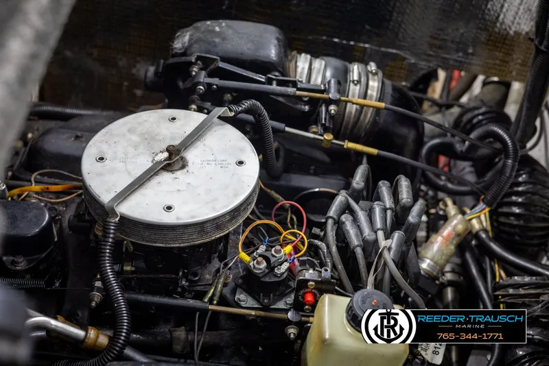 Slide: The Image of Engine of a 1996 Thunderbird Falcon 2270 CD with visible components and wiring. - 39