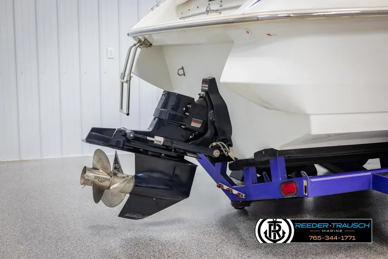 Slide: The Image of 1996 Thunderbird Falcon 2270 CD boat on trailer, showing propeller and stern details. - 40