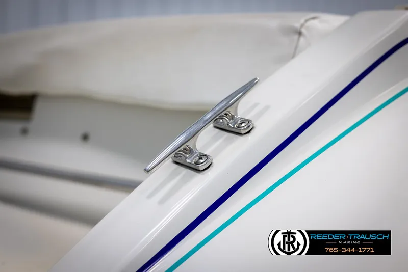 Slide: The Image of 1996 Thunderbird Falcon 2270 CD boat cleat detail with Reeder-Trausch Marine logo. - 49