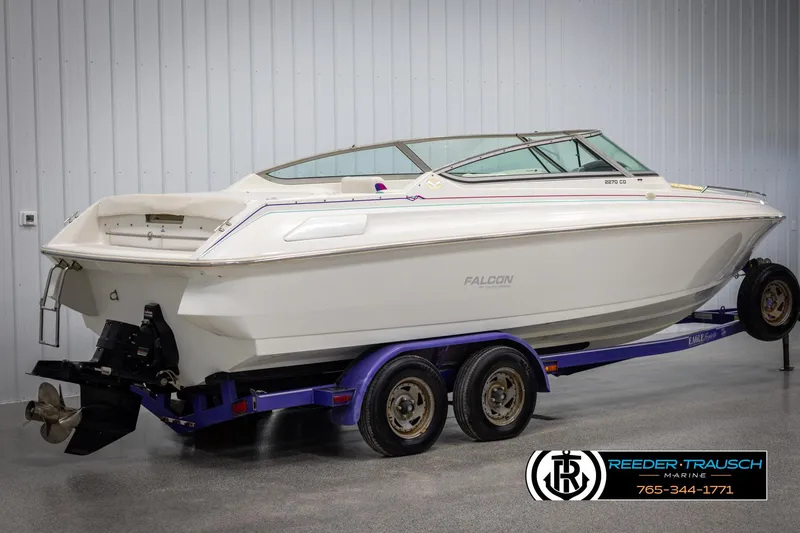 Slide: The Image of 1996 Thunderbird Falcon 2270 CD boat on trailer in showroom. - 5