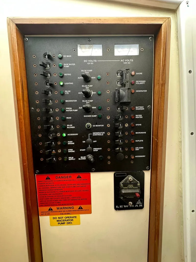 Slide: The Image of Electrical control panel on a 2006 Luhrs 28 Open boat. - 12