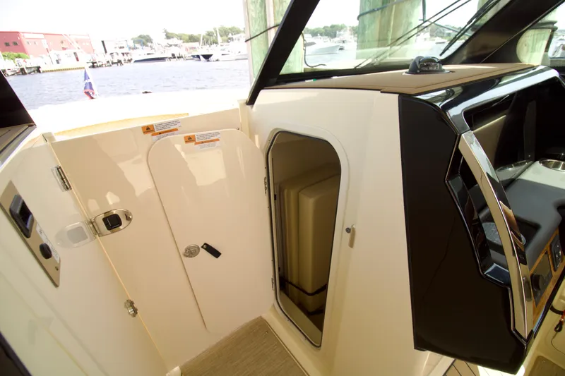 Slide: The Image of 2025 Chris-Craft Calypso 32 cabin entrance with sleek interior design. - 32