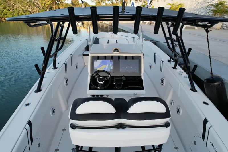 Slide: The Image of 2009 Midnight Express 34' Open boat with sleek design and modern cockpit. - 12