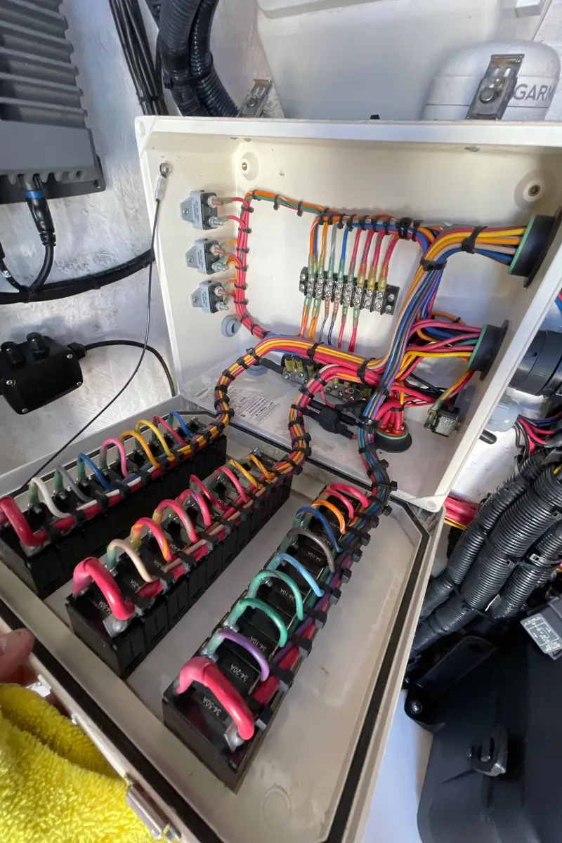 Slide: The Image of Electrical panel of a 2009 Midnight Express 34' Open boat with organized wiring. - 28