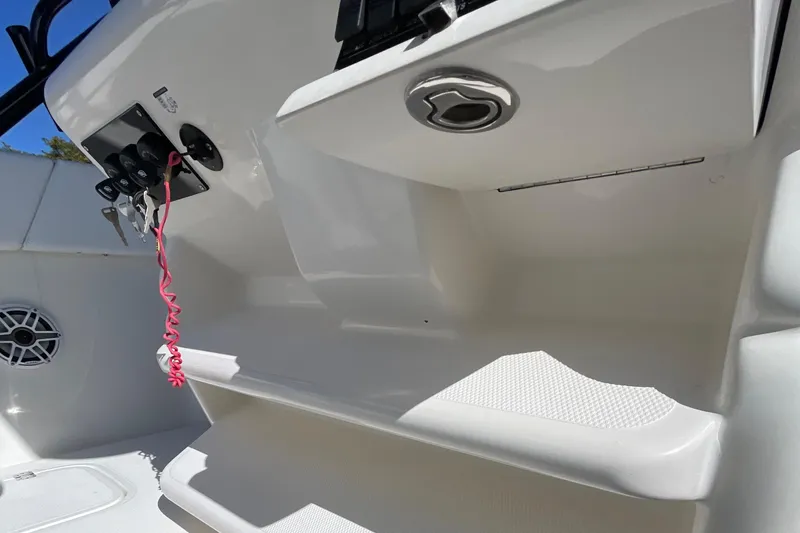 Slide: The Image of 2009 Midnight Express 34' Open boat interior with white steps and control panel. - 31