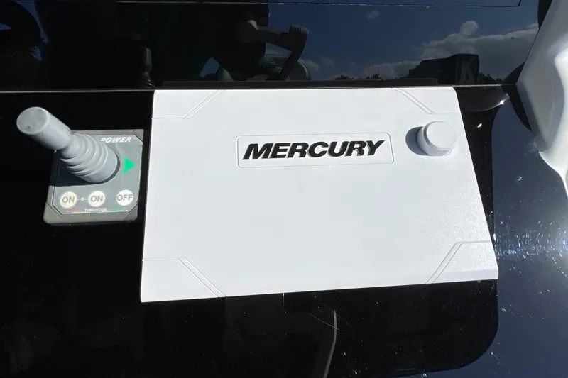 Slide: The Image of Mercury control panel on 2009 Midnight Express 34' Open boat. - 35