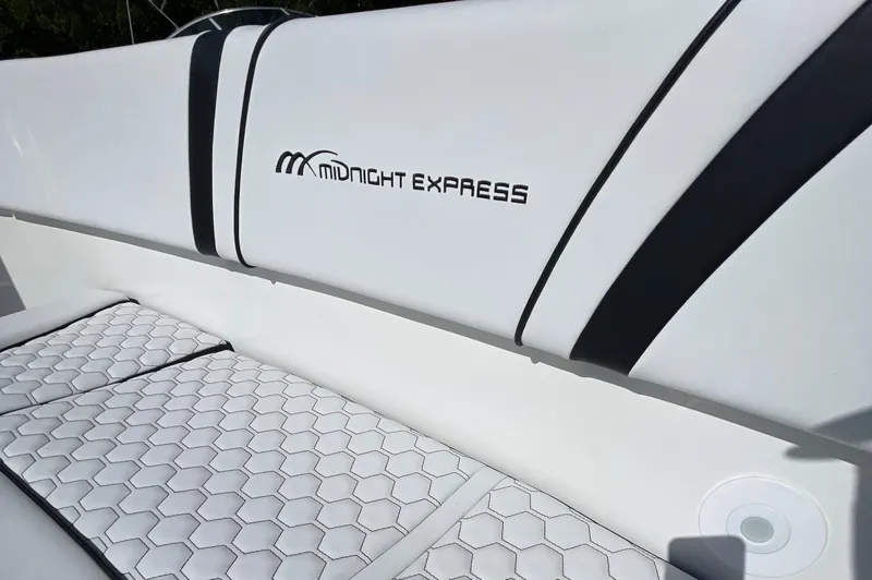 Slide: The Image of 2009 Midnight Express 34' Open boat interior with stylish seating and logo. - 39