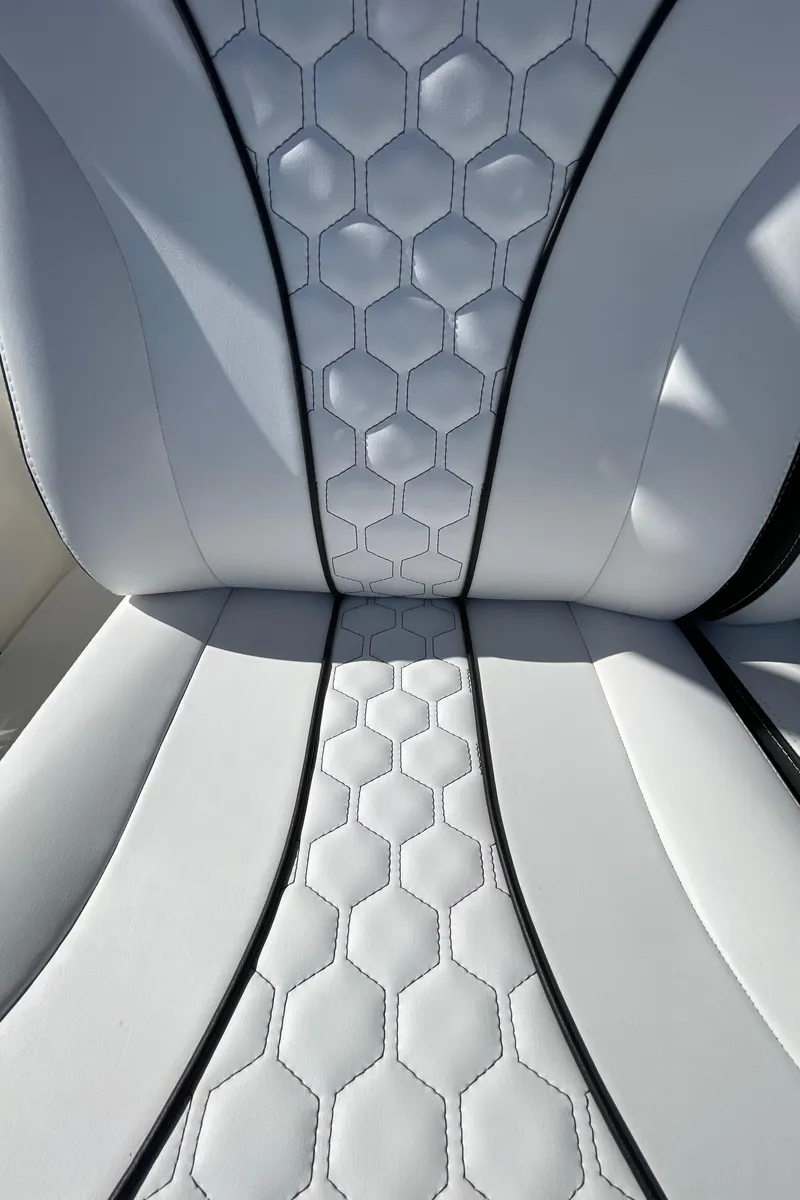 Slide: The Image of White leather boat seat with hexagonal stitching, Midnight Express 34' Open, 2009 model. - 40