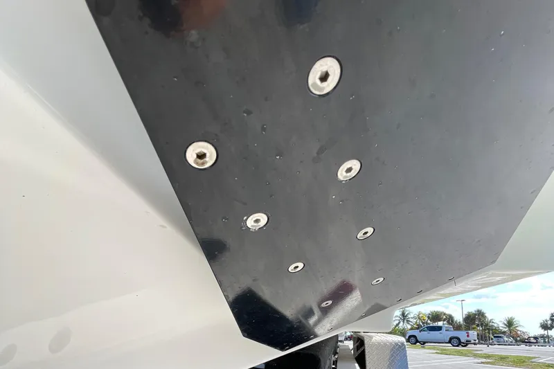 Slide: The Image of Close-up of 2009 Midnight Express 34' Open boat hull with visible screws. - 43