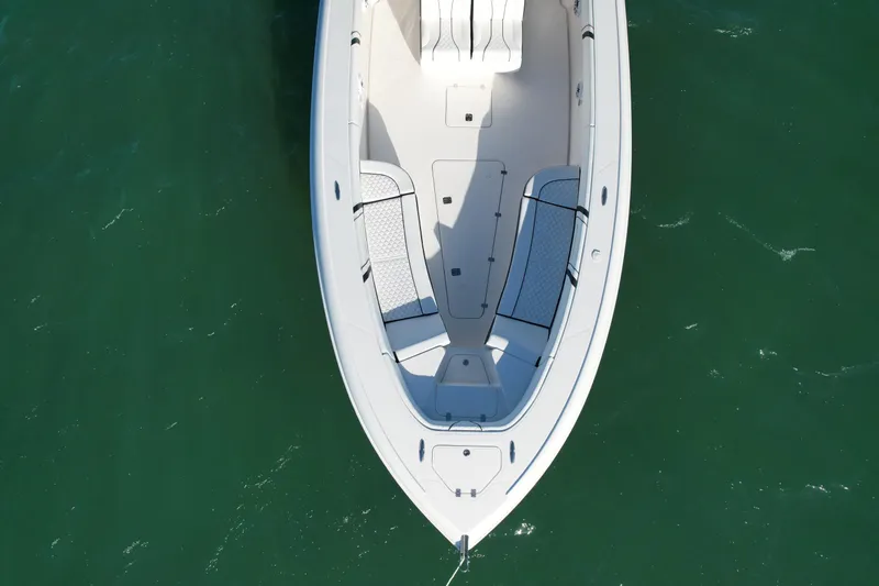Slide: The Image of 2009 Midnight Express 34' Open boat, aerial view, on green water. - 6