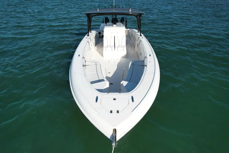 Slide: The Image of 2009 Midnight Express 34' Open boat on calm water, aerial view. - 7