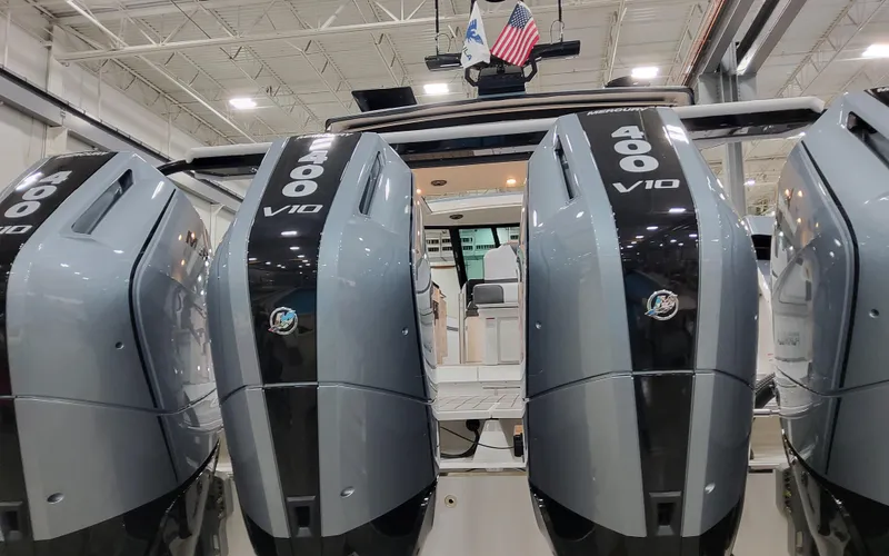 Slide: The Image of 2025 Formula 400 Super Sport Crossover with powerful V10 engines in a showroom. - 17