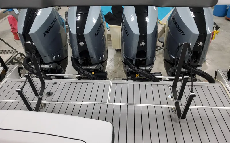 Slide: The Image of 2025 Formula 400 Super Sport Crossover with four Mercury outboard engines. - 19