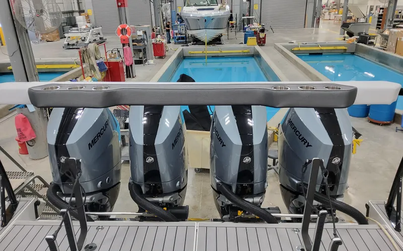 Slide: The Image of 2025 Formula 400 Super Sport Crossover with Mercury engines in a testing facility. - 21