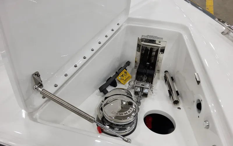 Slide: The Image of 2025 Formula 400 Super Sport Crossover boat anchor compartment with stainless steel fittings. - 22