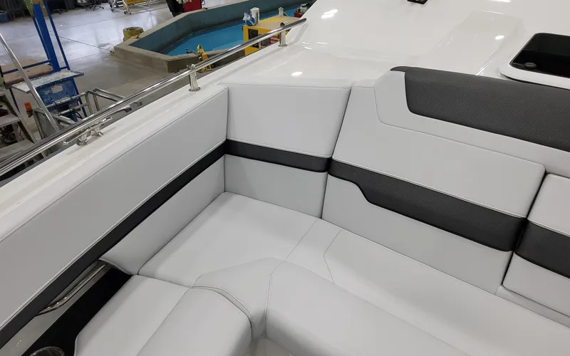 Slide: The Image of Interior seating of 2025 Formula 400 Super Sport Crossover boat, featuring sleek white upholstery. - 27