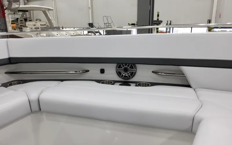 Slide: The Image of 2025 Formula 400 Super Sport Crossover interior with white seating and built-in speaker. - 28