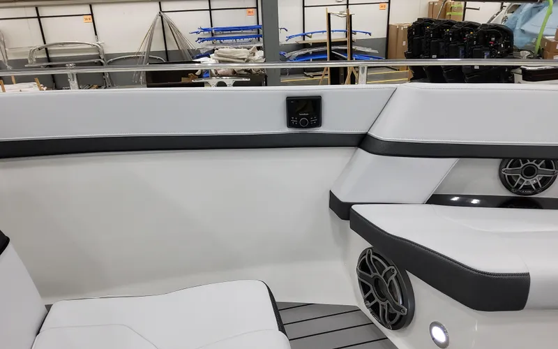 Slide: The Image of 2025 Formula 400 Super Sport Crossover interior with sleek seating and modern audio system. - 31