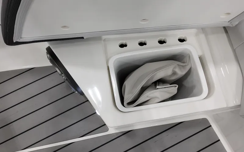Slide: The Image of Storage compartment on 2025 Formula 400 Super Sport Crossover boat with cushions inside. - 33