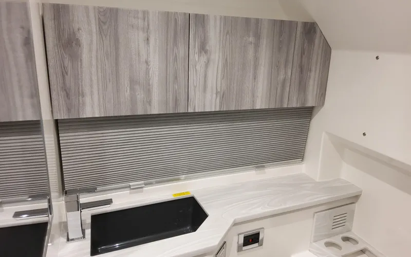 Slide: The Image of Interior of 2025 Formula 400 Super Sport Crossover with modern cabinetry and sleek design. - 43