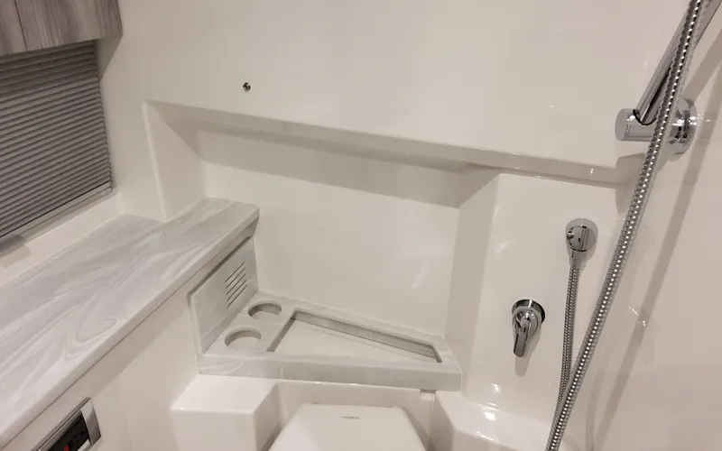 Slide: The Image of Interior of 2025 Formula 400 Super Sport Crossover, featuring sleek bathroom design. - 44