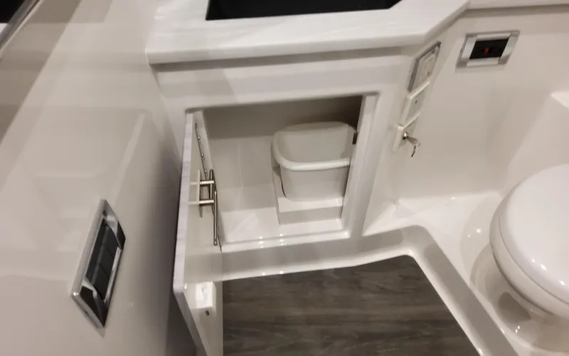 Slide: The Image of 2025 Formula 400 Super Sport Crossover interior with compact storage and modern design. - 45