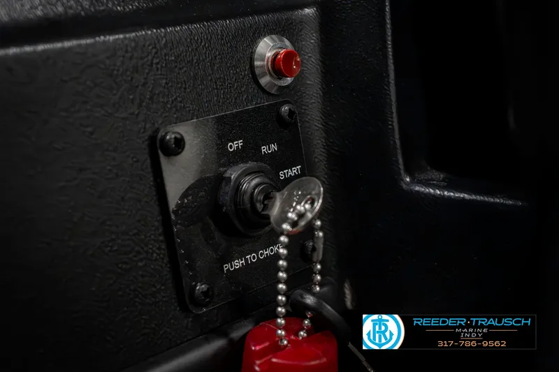 Slide: The Image of Control panel of 2023 Lowe FM 1775 boat with ignition switch and key. - 40