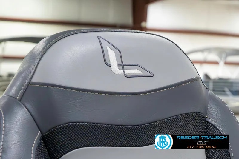 Slide: The Image of Gray seat of 2023 Lowe FM 1775 boat with logo, Reeder-Trausch branding visible. - 43