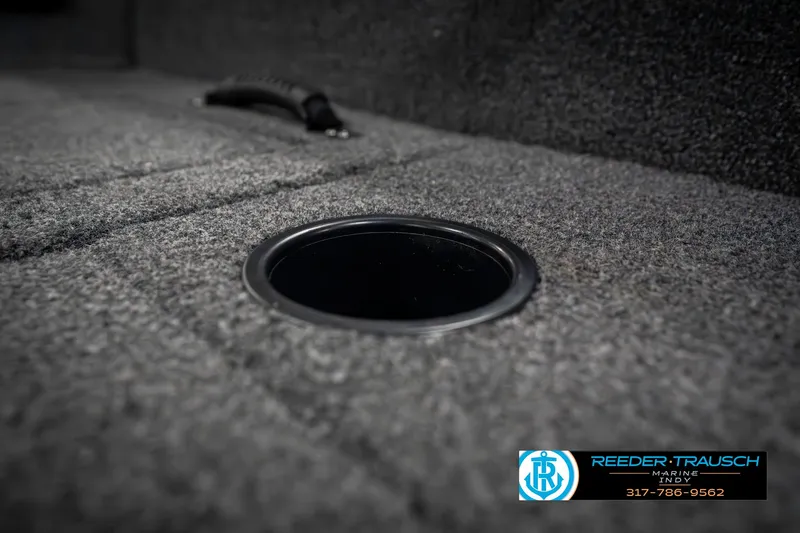 Slide: The Image of 2023 Lowe FM 1775 boat interior with cup holder and textured flooring. - 44