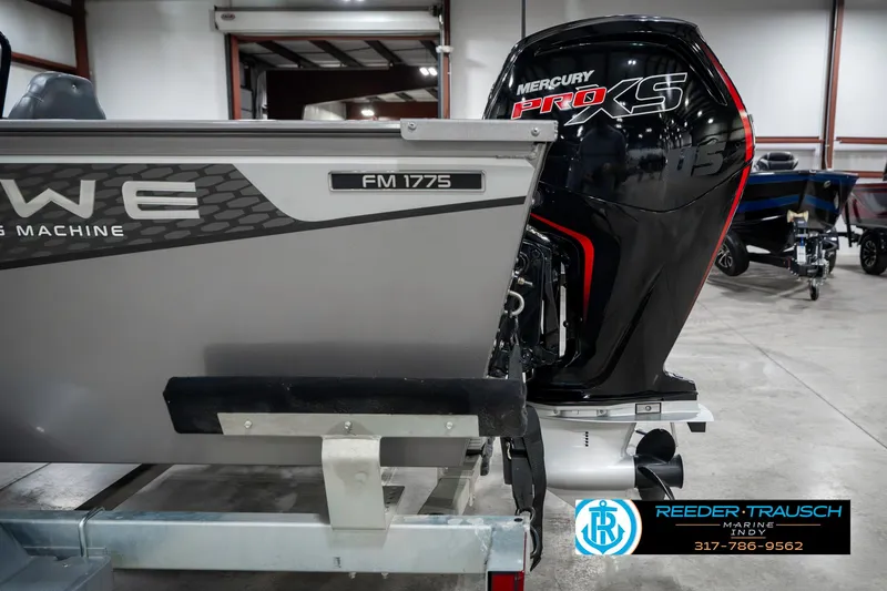 Slide: The Image of 2023 Lowe FM 1775 boat with Mercury Pro XS engine in showroom. - 49