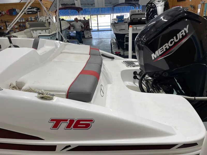 Slide: The Image of 2020 Tahoe T16 boat with Mercury engine in showroom. - 11