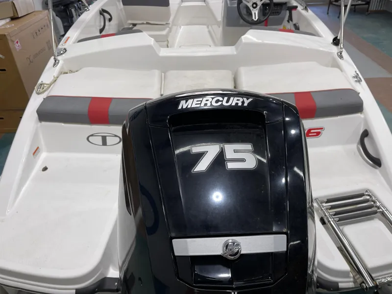 Slide: The Image of 2020 Tahoe T16 boat with Mercury 75 engine, interior view. - 21