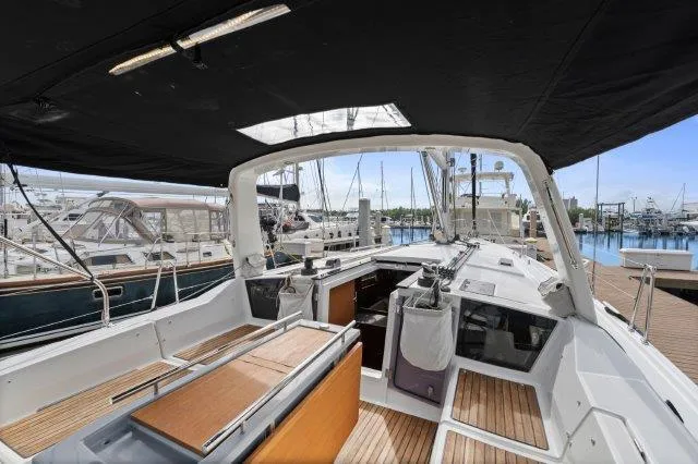 Slide: The Image of 2018 Beneteau Oceanis 41.1 yacht interior, featuring spacious cockpit and modern design at marina. - 29