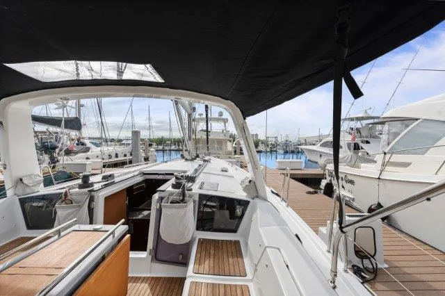 Slide: The Image of 2018 Beneteau Oceanis 41.1 sailboat docked, showcasing spacious deck and modern design. - 30