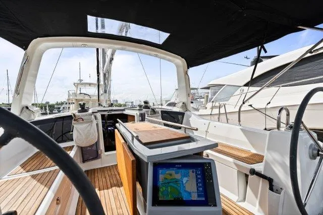 Slide: The Image of Cockpit view of 2018 Beneteau Oceanis 41.1 sailboat with navigation display. - 41
