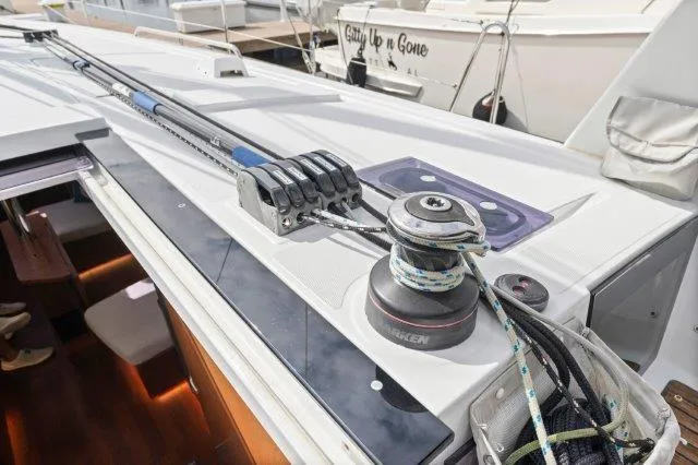 Slide: The Image of 2018 Beneteau Oceanis 41.1 yacht deck with winch and rigging details. - 45