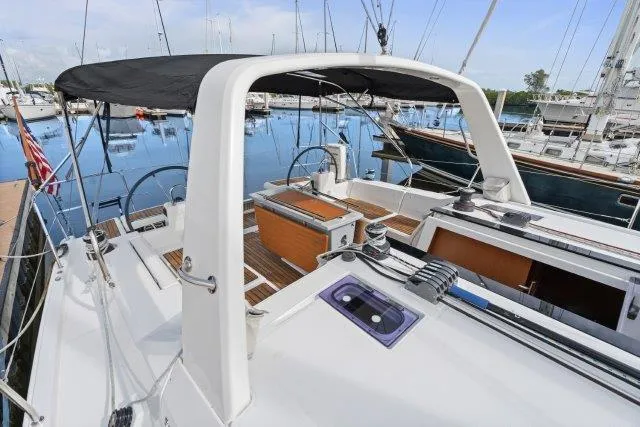 Slide: The Image of 2018 Beneteau Oceanis 41.1 sailboat with dual helm, docked in a marina. - 47