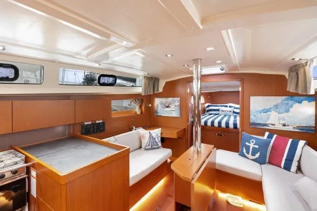 Slide: The Image of Interior of 2018 Beneteau Oceanis 41.1 yacht with modern furnishings and cozy seating. - 5