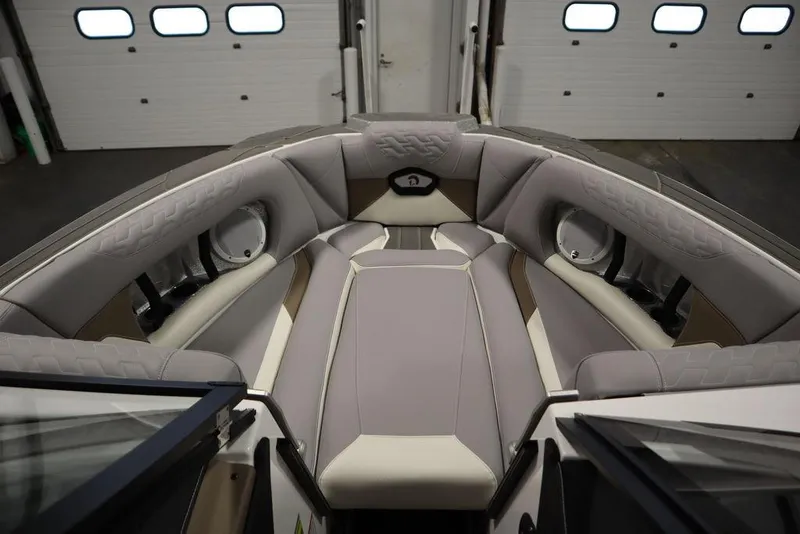 Slide: The Image of Interior of 2025 Centurion Ri245 boat with luxurious seating and modern design. - 11