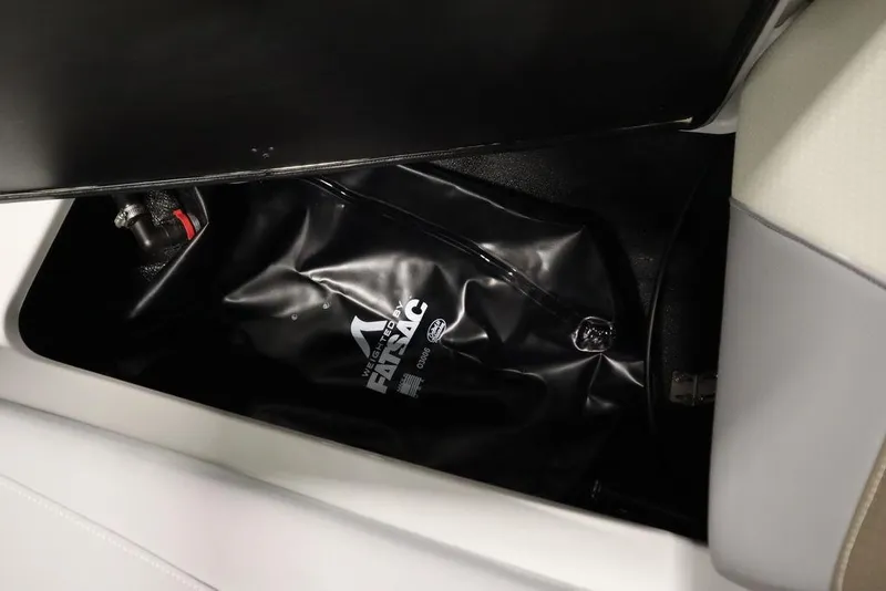 Slide: The Image of Centurion Ri245 2025 boat storage compartment with ballast bag. - 13