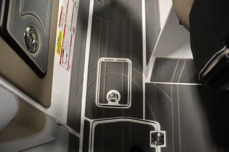 Slide: The Image of Interior flooring of 2025 Centurion Ri245 boat, featuring sleek design and modern materials. - 28