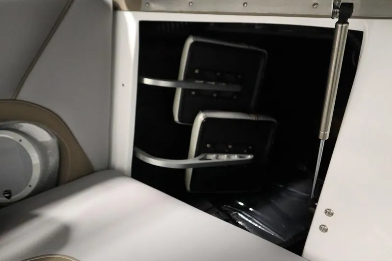 Slide: The Image of Interior view of 2025 Centurion Ri245 boat storage compartment. - 37