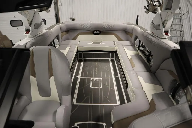 Slide: The Image of 2025 Centurion Ri245 boat interior with luxurious seating and modern design. - 38