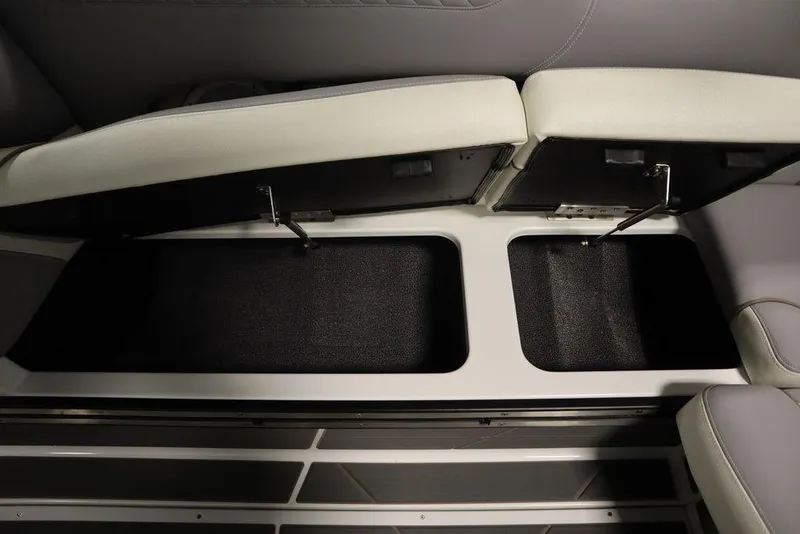 Slide: The Image of 2025 Centurion Ri245 interior storage compartment with open seats, showcasing ample space. - 49