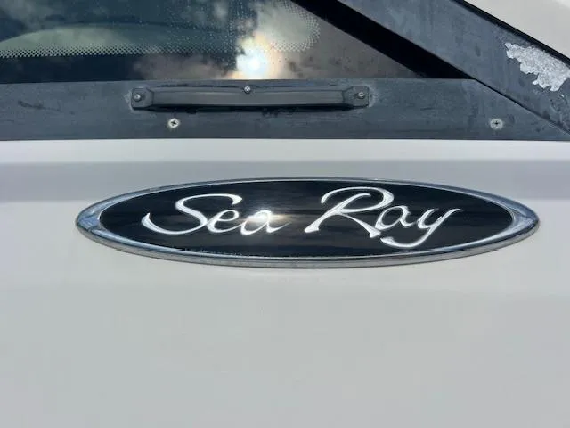 Slide: The Image of Sea Ray logo on 2008 Sea Ray 55 Sundancer yacht, close-up view. - 16