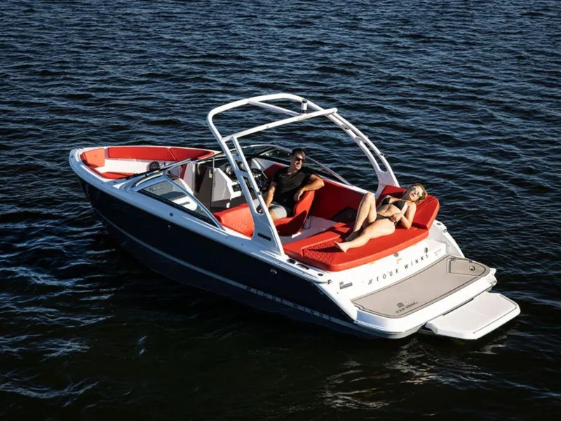Slide: The Image of 2025 Four Winns H1 boat on water with passengers relaxing. - 11